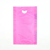 12" x 3" x 18" 0.7 mil Magenta HDPE Merchandise Bags w/ Die Cut Handle