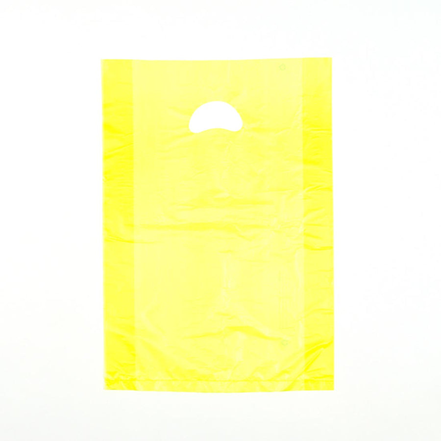13" x 3" x 21" 0.7 mil Yellow HDPE Merchandise Bags w/ Die Cut Handle
