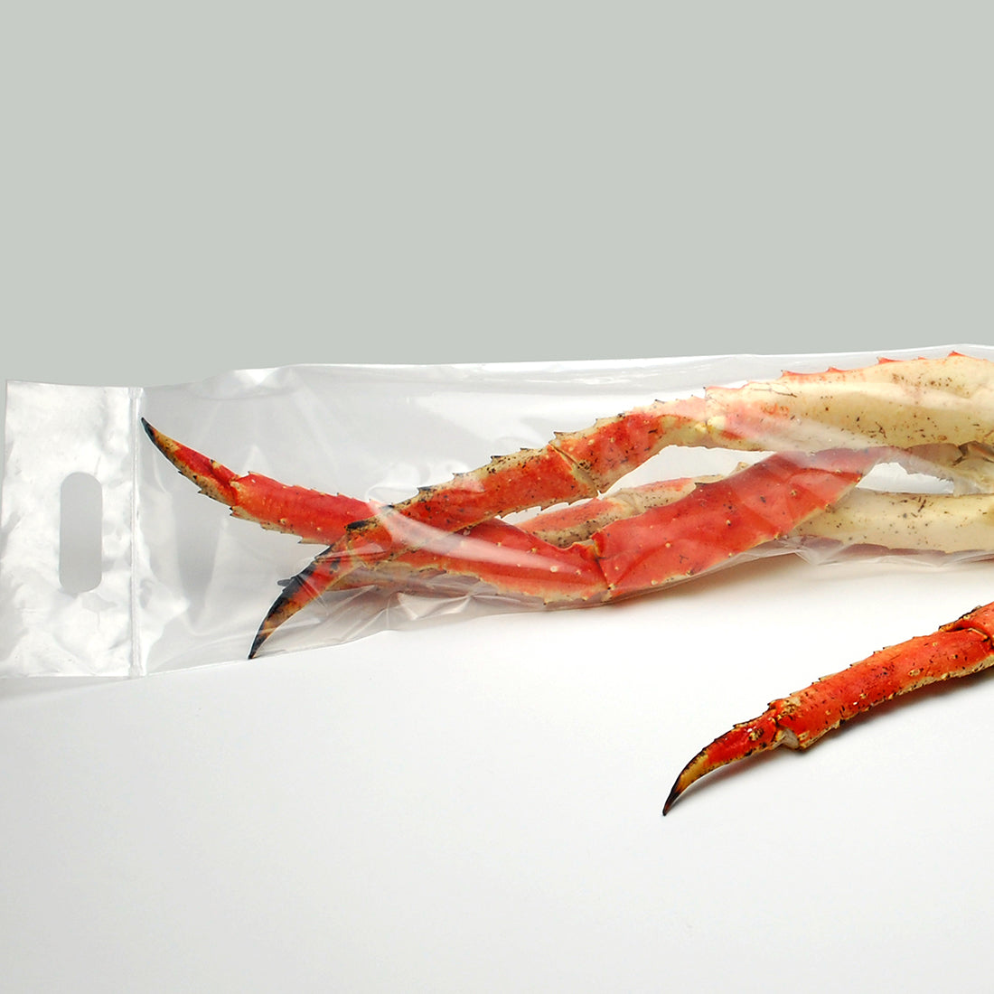 7" x 25" 3.5 mil Crab Leg Zipper Bag w/ Die Cut Handle
